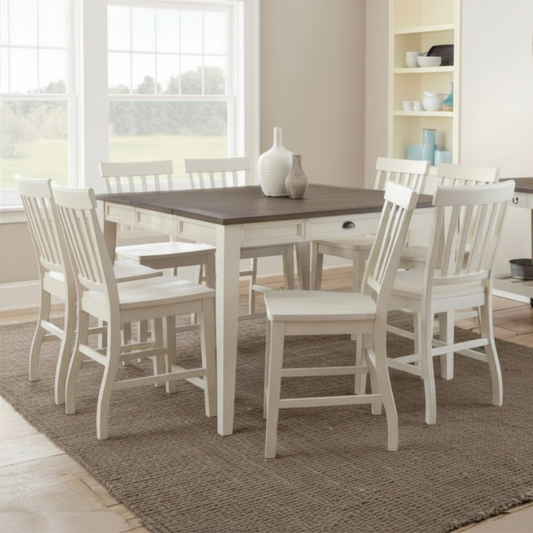 Dining room with a wooden table and white chairs on a brown rug.