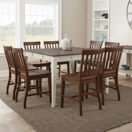 Dining room with wooden table and chairs in a well-lit room.