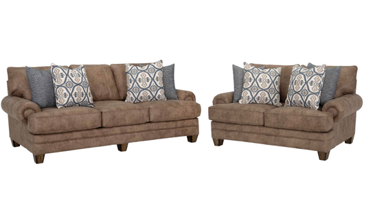 Brown sofa set with patterned cushions on a white background