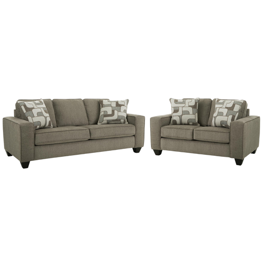 Gray sofa set with patterned cushions on a white background