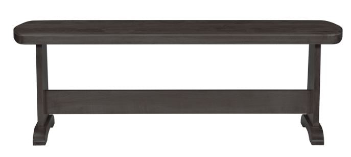 A gray wooden trestle bench designed for seating, viewed from a side angle that highlights its backless design and solid wooden construction.