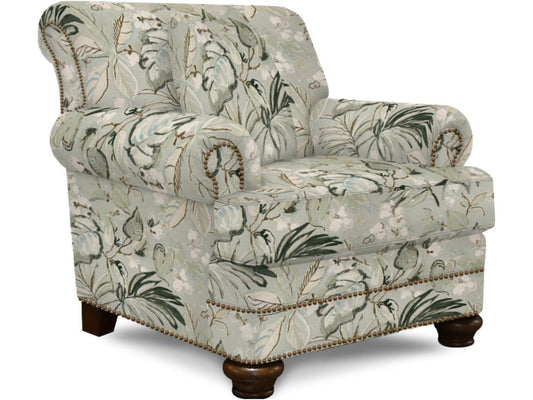 Patterned armchair with floral design on a white background