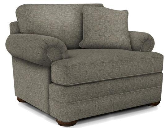 A gray upholstered Knox chair with roll arm and bun foot, featuring a T-cushion and a square patterned throw pillow on the arm.