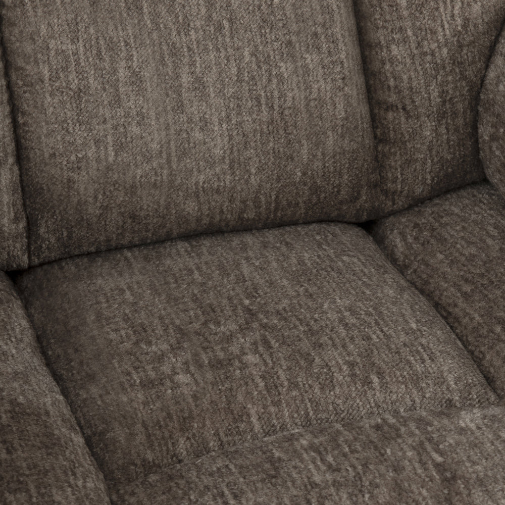 Close-up of a textured brown sofa cushion