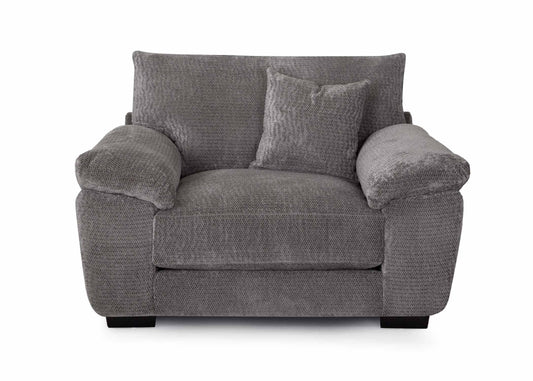 A gray upholstered shimmer chair with pillow top arms and a plush backrest.