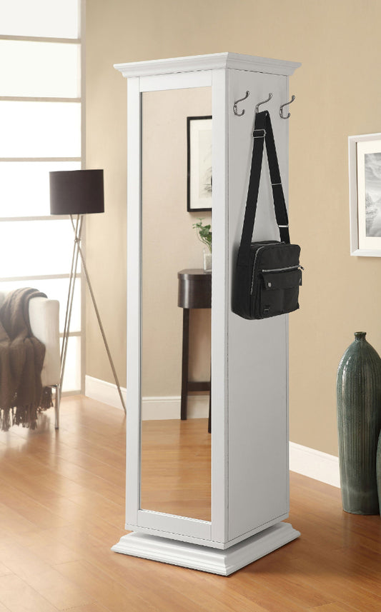 White standing mirror with coat hooks in a room setting