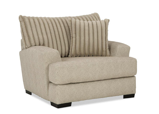 A beige upholstered chair with wide track arms and accent pillows, designed in a chenille-like fabric.