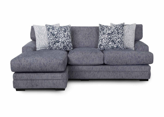 A gray upholstered sofa with a reversible chaise on the right side, featuring plush cushions