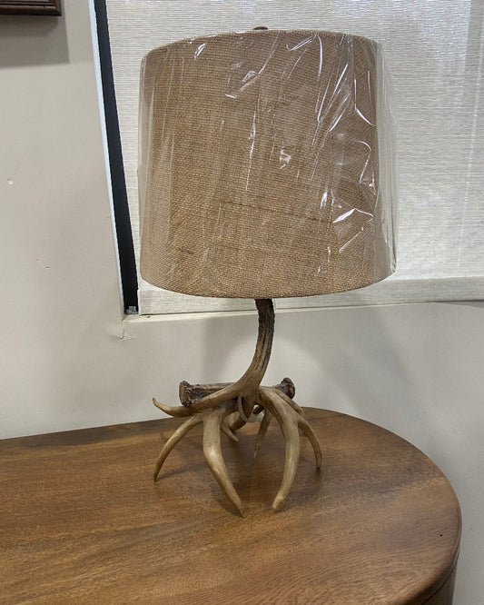 Lamp with natural antler base and burlap shade