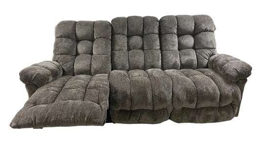 brown reclined sofa on a white background