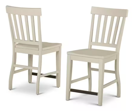 Two beige wooden chairs on a white background