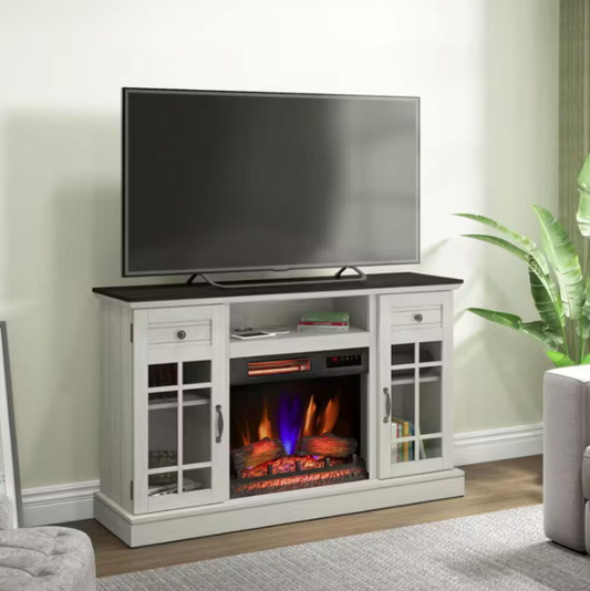 White entertainment console with TV and electric fireplace in a living room setting.