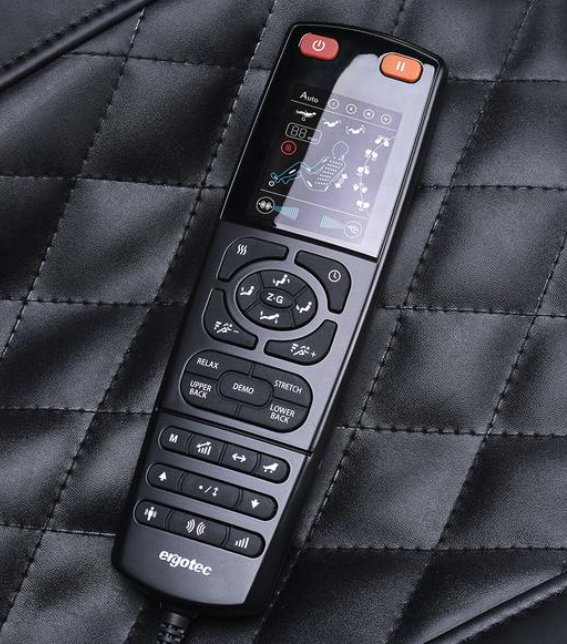 Remote control with buttons and display on a textured surface