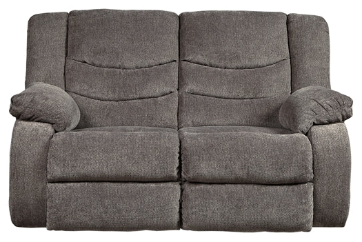 Gray reclining loveseat on a white background