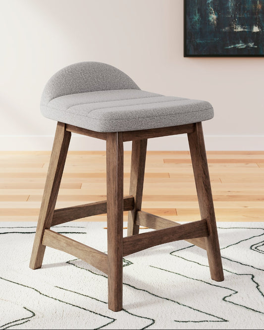 gray upholstered stool