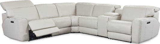 cream sectional sofa with reclining features on a white background