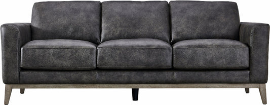 Gray sofa with wooden legs on a plain background
