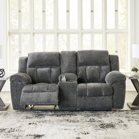 grey reclining loveseat in living room