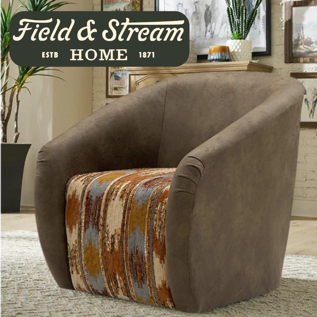A brown upholstered barrel-style armchair with a patterned seat cushion in rust, beige, and blue tones, shown in a living room setting with a Field & Stream Home logo overlay in the top left.