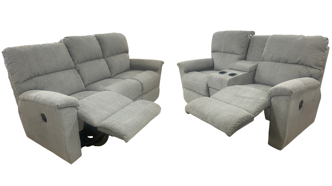 gray reclining sofa and loveseat on a white background