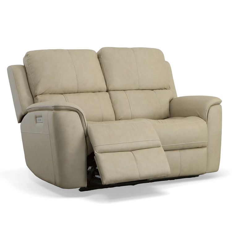 cream reclining loveseat on a white background
