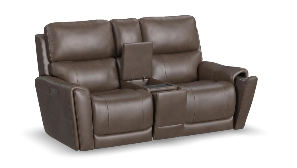Brown leather reclining sofa with cup holders on a white background