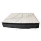 Mattress with a white top and black base on a white background