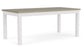 A rectangular dining table with a white butterfly leaf and gray top, featuring a simple design with the butterfly leaf stored under the tabletop.