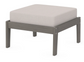 A cream cushioned deep seating ottoman with a driftwood frame, made from all-weather materials suitable for outdoor use.