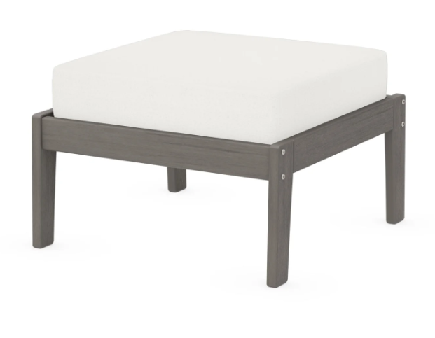A white cushioned deep seating ottoman with a driftwood frame, made from all-weather materials suitable for outdoor use.