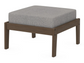 A gray cushioned deep seating ottoman with a kona frame, made from all-weather materials suitable for outdoor use.