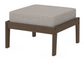A gray cushioned deep seating ottoman with a kona frame, made from all-weather materials suitable for outdoor use.