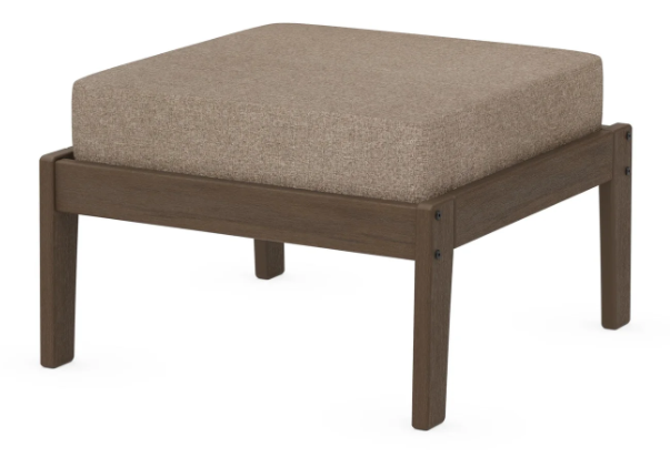 A beige cushioned deep seating ottoman with a kona frame, made from all-weather materials suitable for outdoor use.