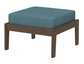 A teal cushioned deep seating ottoman with a kona frame, made from all-weather materials suitable for outdoor use.