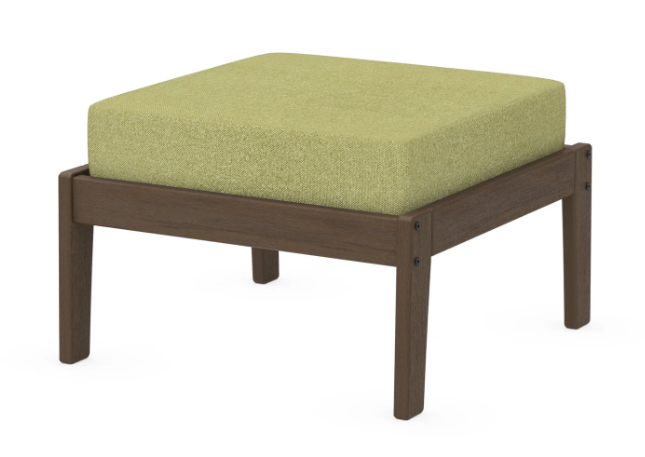 A green cushioned deep seating ottoman with a kona frame, made from all-weather materials suitable for outdoor use.