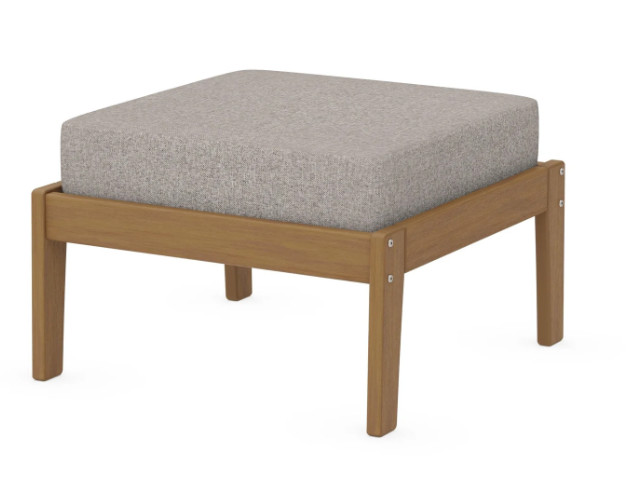 A gray cushioned deep seating ottoman with a natural frame, made from all-weather materials suitable for outdoor use.