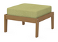A green cushioned deep seating ottoman with a natural frame, made from all-weather materials suitable for outdoor use.