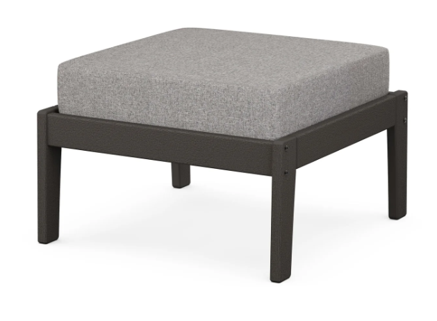A gray cushioned deep seating ottoman with a vintage coffee frame, made from all-weather materials suitable for outdoor use.