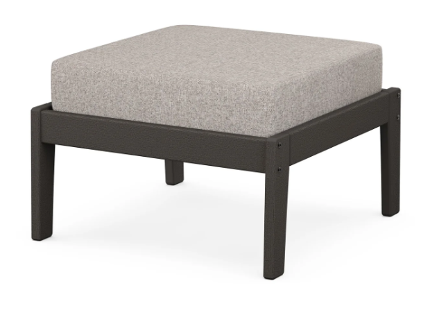 A gray cushioned deep seating ottoman with a vintage coffee frame, made from all-weather materials suitable for outdoor use.