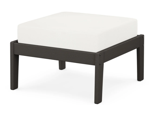 A white cushioned deep seating ottoman with a vintage coffee frame, made from all-weather materials suitable for outdoor use.