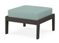 A light blue cushioned deep seating ottoman with a vintage coffee frame, made from all-weather materials suitable for outdoor use.