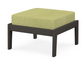 A green cushioned deep seating ottoman with a vintage coffee frame, made from all-weather materials suitable for outdoor use.