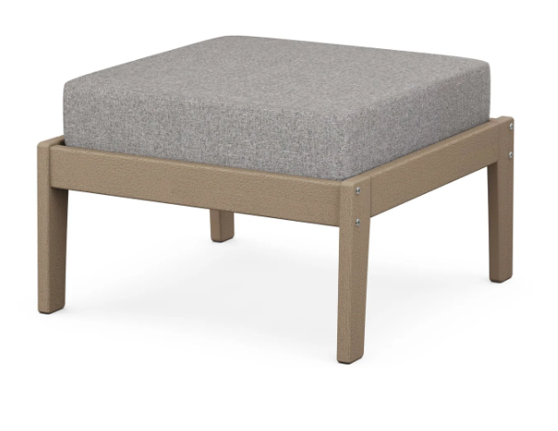 A gray cushioned deep seating ottoman with a vintage sahara frame, made from all-weather materials suitable for outdoor use.