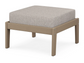 A gray cushioned deep seating ottoman with a vintage sahara frame, made from all-weather materials suitable for outdoor use.