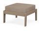 A beige cushioned deep seating ottoman with a vintage sahara frame, made from all-weather materials suitable for outdoor use.
