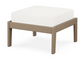 A white cushioned deep seating ottoman with a vintage sahara frame, made from all-weather materials suitable for outdoor use.