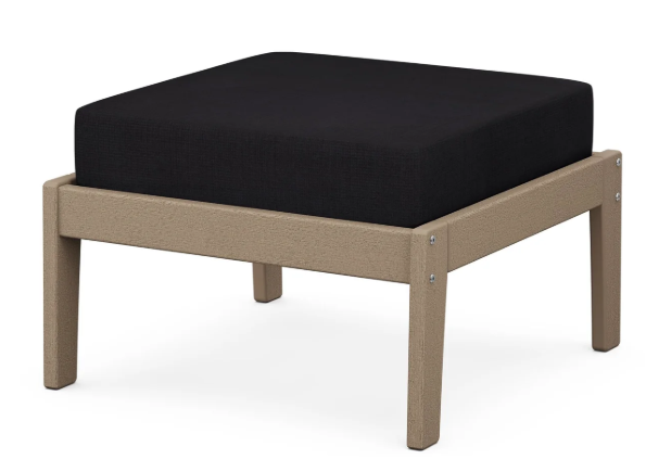 A dark blue cushioned deep seating ottoman with a vintage sahara frame, made from all-weather materials suitable for outdoor use.