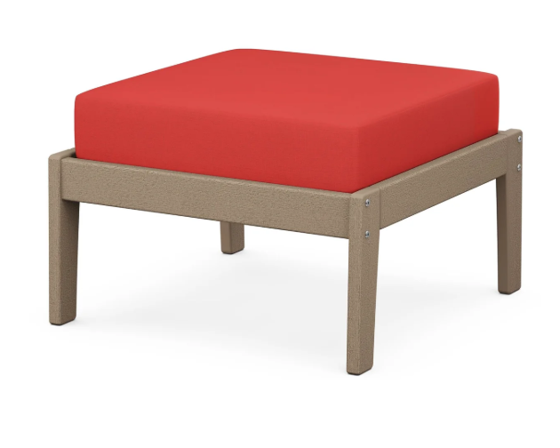 A red cushioned deep seating ottoman with a vintage sahara frame, made from all-weather materials suitable for outdoor use.