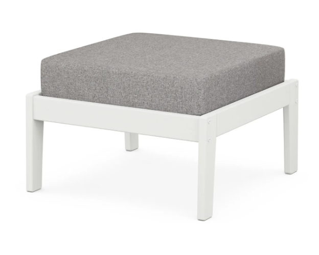 A gray cushioned deep seating ottoman with a vintage white frame, made from all-weather materials suitable for outdoor use.