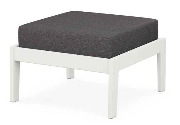 A dark gray cushioned deep seating ottoman with a vintage white frame, made from all-weather materials suitable for outdoor use.